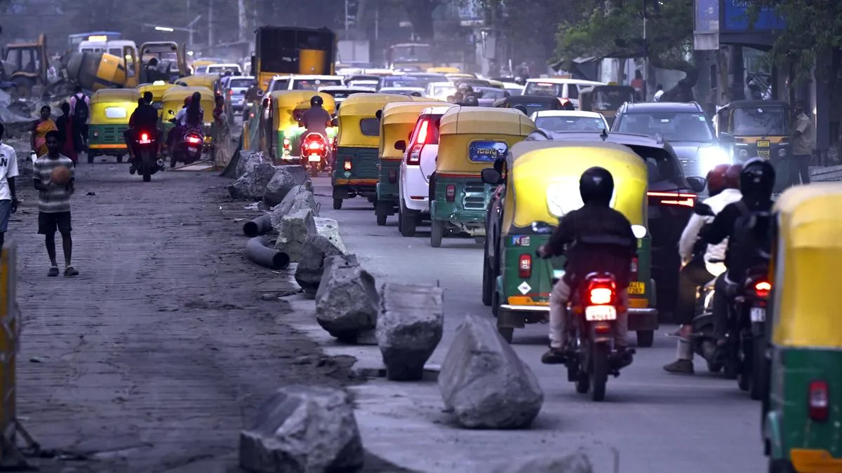 Dust, bottlenecks and stench greet Srinivagilu Road commuters as white-topping works drag on