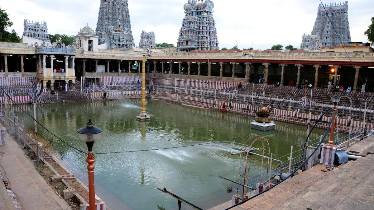 File report on steps taken to chant Tamil hymns at consecration of Meenakshi temple, HC tells T.N. government