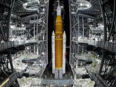  NASA hauls repaired moon rocket from hangar back to the pad for an early April launch